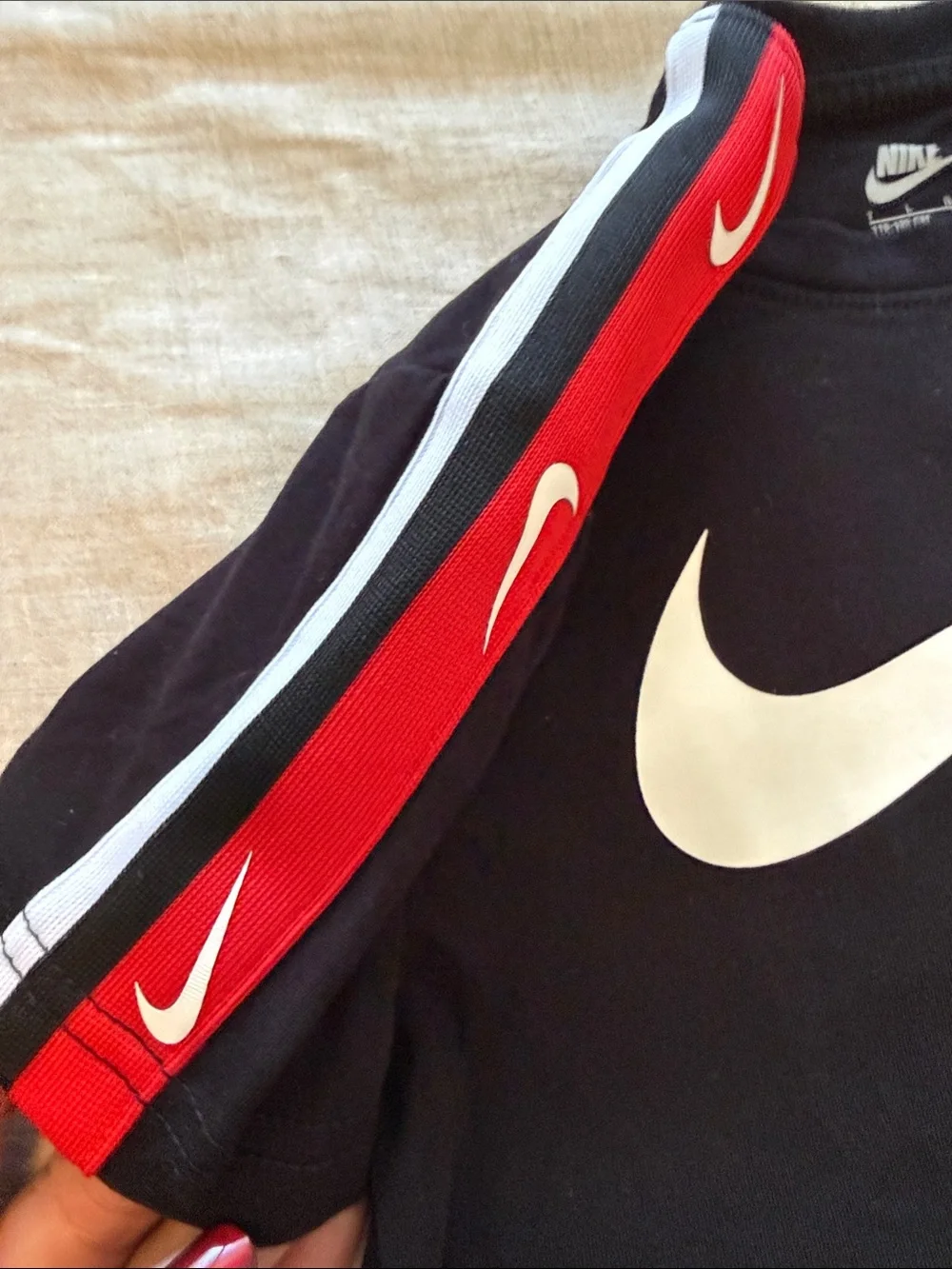 Nike Black Tee with White Swoosh and Red Shoulder Stripes